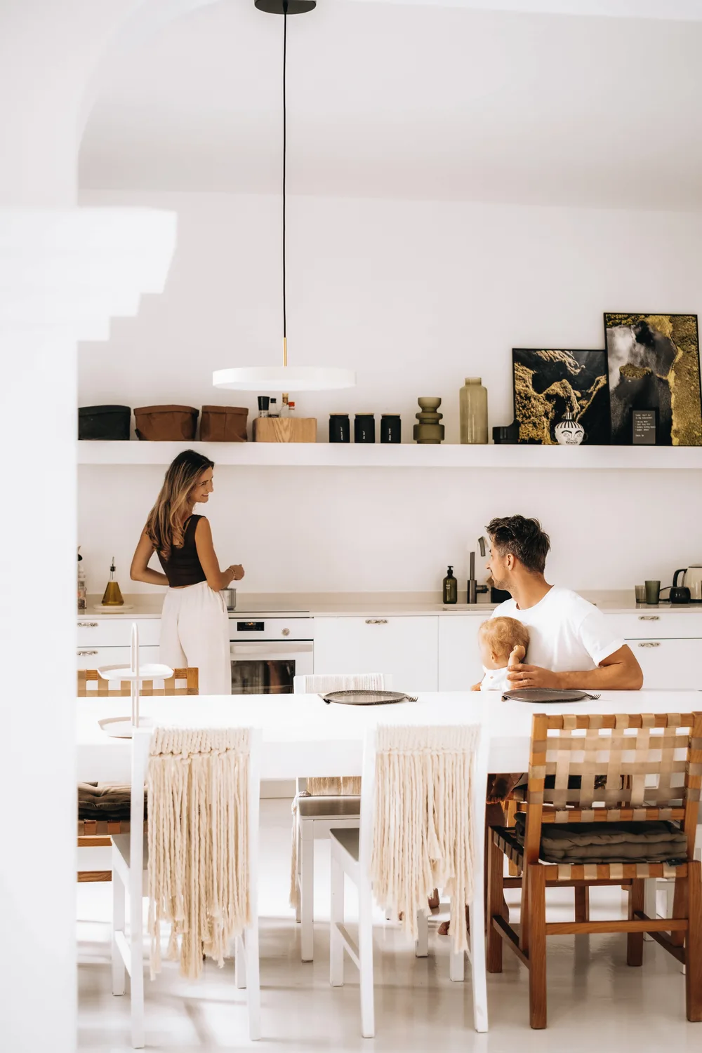 A family sharing a relaxed morning around Amonita’s kitchen table